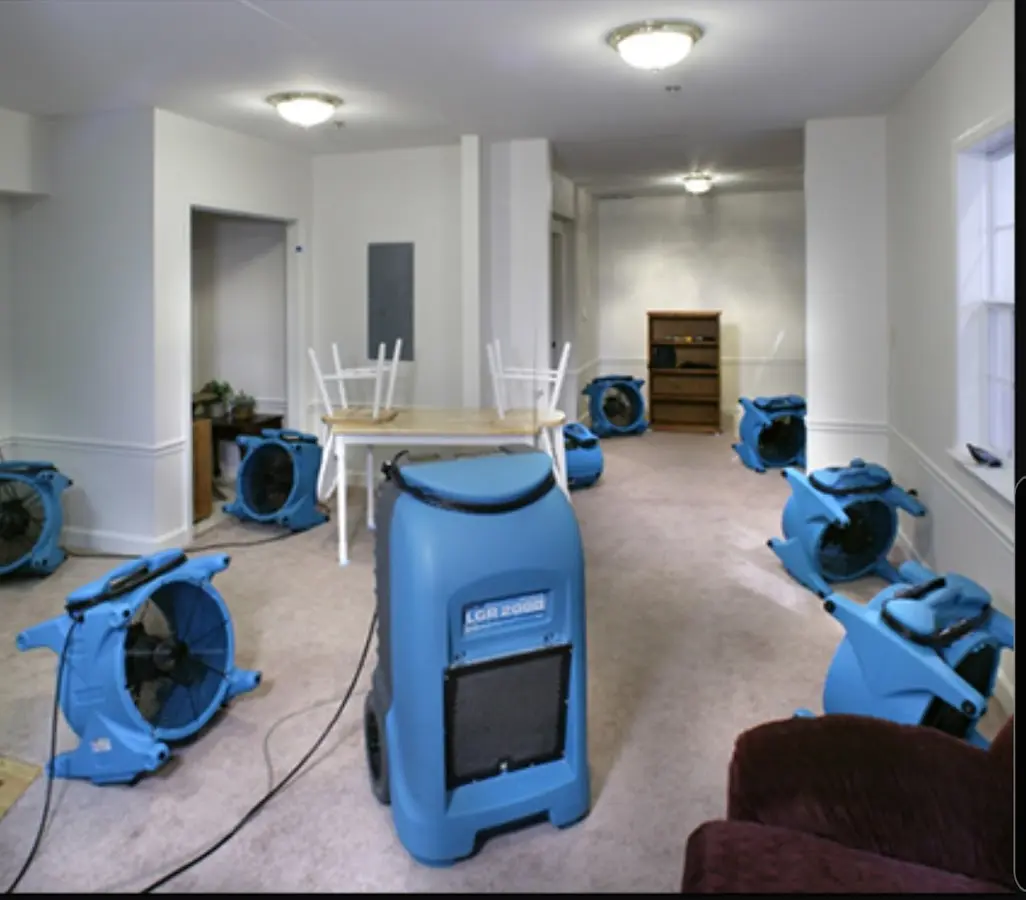 Air movers and dehumidifier setup for Water Damage Restoration in Belmont